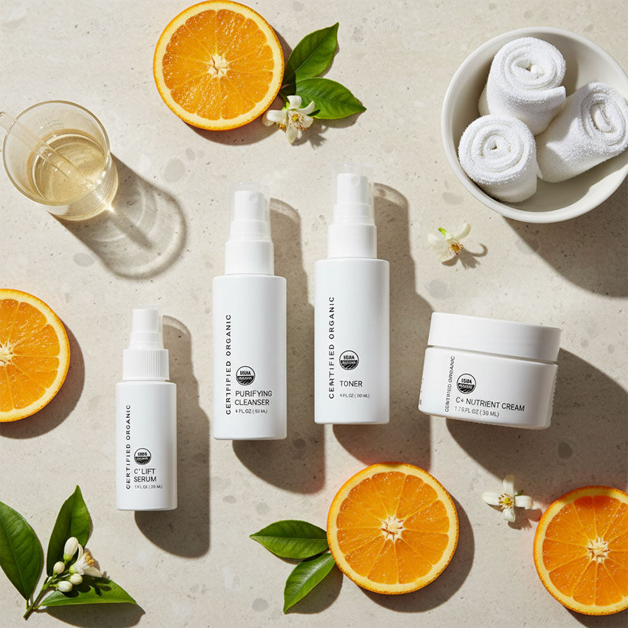 Skincare products with oranges